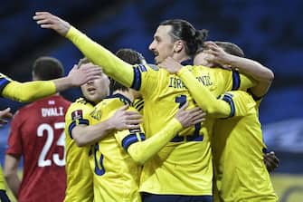 Sweden's forward Zlatan Ibrahimovic (C) and his teammates celebrate the first goal during the FIFA World Cup Qatar 2022 qualification football match Sweden v Georgia in Solna, near Stockholm on March 25, 2021. - Sweden OUT (Photo by Janerik HENRIKSSON / TT NEWS AGENCY / AFP) / Sweden OUT (Photo by JANERIK HENRIKSSON/TT NEWS AGENCY/AFP via Getty Images)