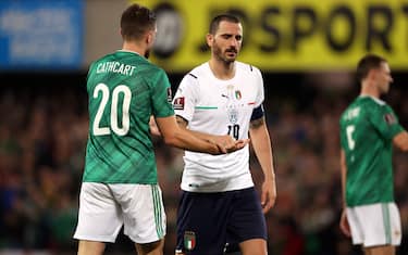 Northern Ireland's Craig Cathcart and Italy's Leonardo Bonucci after the FIFA World Cup Qualifying match at Windsor Park, Belfast. Picture date: Monday November 15, 2021.
