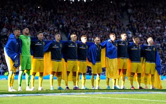 Ukraine players line up on the pitch ahead of the FIFA World Cup 2022 Qualifier play-off semi-final match at Hampden Park, Glasgow. Picture date: Wednesday June 1, 2022. (Photo by Andrew Milligan/PA Images via Getty Images)
