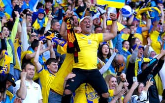 Ukraine fans celebrate after Andriy Yarmolenko scores their side's first goal of the game during the FIFA World Cup 2022 Qualifier play-off semi-final match at Hampden Park, Glasgow. Picture date: Wednesday June 1, 2022. (Photo by Andrew Milligan/PA Images via Getty Images)