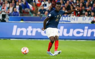 France's defender Benoit Badiashile passes the ball during the UEFA Nations League, League A Group 1, football match between France and Austria at Stade de France in Saint-Denis, near Paris, FRANCE - 22/09/2022