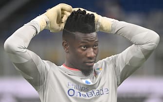 Goalkeeper André Onana attends the Integration Heroes Match charity soccer match at the Giuseppe Meazza stadium, Milan, Italy, 23 May 2022. The meeting  was organized by former Barcelona and Inter Milan player Samuel Eto o to promote inclusiveness and multiculturalism. The proceeds from the event will be donated to two associations. One is the Samuel Eto'o Foundation, which has conducted a series of projects related to the education, education, cooperation and development of children in Cameroon, using football as a social tool. And to Slums Dunk , association created by basketball players Bruno Cerella e Tommaso Marino, to improve the living conditions of young people and children who live in the most socially and economically backward areas of the planet. ANSA/DANIEL DAL ZENNARO