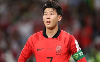 AL RAYYAN, QATAR - NOVEMBER 28: A dejected Son Heung-Min of Korea Republic reacts at full time during the FIFA World Cup Qatar 2022 Group H match between Korea Republic and Ghana at Education City Stadium on November 28, 2022 in Al Rayyan, Qatar. (Photo by Matthew Ashton - AMA/Getty Images)