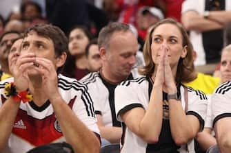 AL KHOR, QATAR - DECEMBER 01: Germany fans react during the FIFA World Cup Qatar 2022 Group E match between Costa Rica and Germany at Al Bayt Stadium on December 01, 2022 in Al Khor, Qatar. (Photo by Alex Pantling/Getty Images)