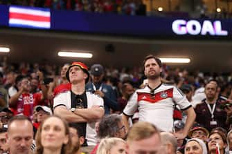 AL KHOR, QATAR - DECEMBER 01: Germany fans react after Costa Rica scored their sides second goal during the FIFA World Cup Qatar 2022 Group E match between Costa Rica and Germany at Al Bayt Stadium on December 01, 2022 in Al Khor, Qatar. (Photo by Alex Pantling/Getty Images)