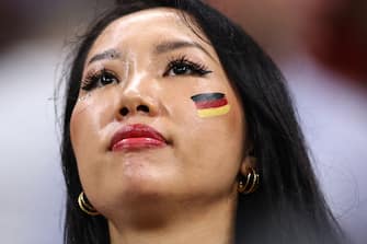 AL KHOR, QATAR - DECEMBER 01: A female fan of Germany during the FIFA World Cup Qatar 2022 Group E match between Costa Rica and Germany at Al Bayt Stadium on December 1, 2022 in Al Khor, Qatar. (Photo by Robbie Jay Barratt - AMA/Getty Images)