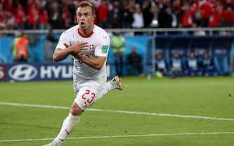epa06832010 Xherdan Shaqiri of Switzerland celebrates scoring the 2-1 lead during the FIFA World Cup 2018 group E preliminary round soccer match between Serbia and Switzerland in Kaliningrad, Russia, 22 June 2018.

(RESTRICTIONS APPLY: Editorial Use Only, not used in association with any commercial entity - Images must not be used in any form of alert service or push service of any kind including via mobile alert services, downloads to mobile devices or MMS messaging - Images must appear as still images and must not emulate match action video footage - No alteration is made to, and no text or image is superimposed over, any published image which: (a) intentionally obscures or removes a sponsor identification image; or (b) adds or overlays the commercial identification of any third party which is not officially associated with the FIFA World Cup)  EPA/MARTIN DIVISEK   EDITORIAL USE ONLY