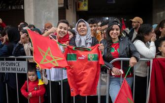 epa10375043 Supporters of Moroccan national soccer team cheer upon the return of the players from the FIFA World Cup 2022 soccer tournament in Qatar,  in Rabat, Morocco, 20 December 2022.  EPA/Jalal Morchidi
