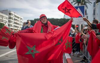 epa10375047 Supporters of Moroccan national soccer team cheer upon the return of the players from the FIFA World Cup 2022 soccer tournament in Qatar,  in Rabat, Morocco, 20 December 2022.  EPA/Jalal Morchidi