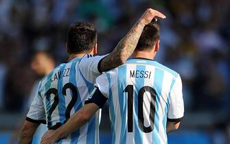 Lionel Messi of Argentina is congratulated by team-mate Ezequiel Lavezzi after scoring the opening goal during the 2014 FIFA World Cup Group F match at the Estadio Mineirao in Belo Horizonte, Brazil on June 21, 2014. UPI/Chris Brunskill