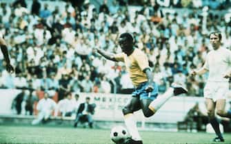 World Cup 1970 Brazil 4 Czechoslovakia 1 Jalisco, Guadalajara Pele is watched by a Czech player as he strikes the ball. Mexico