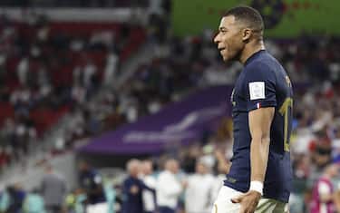 (221204) -- DOHA, Dec. 4, 2022 (Xinhua) -- Kylian Mbappe of France celebrates his goal during the Round of 16 match between France and Poland of the 2022 FIFA World Cup at Al Thumama Stadium in Doha, Qatar, Dec. 4, 2022. (Xinhua/Cao Can) - Cao Can -//CHINENOUVELLE_CHINENOUVELLE0617/Credit:CHINE NOUVELLE/SIPA/2212050823/Credit:CHINE NOUVELLE/SIPA/2212050940