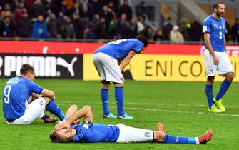 Italy's players show their dejection at the end of the FIFA World Cup 2018 qualification playoff second leg soccer match between Italy and Sweden at the Giuseppe Meazza stadium in Milan, Italy, 13 November 2017.
ANSA/DANIEL DAL ZENNARO