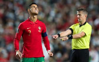 epa09582423 Portugal's player Cristiano Ronaldo reacts during the FIFA World Cup 2022 qualifying group A soccer match Portugal vs Serbia at Luz Stadium in Lisbon, Portugal, 14 November 2021.  EPA/ANTONIO COTRIM