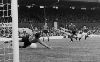 19th July 1966:  Italian goalkeeper Enrico Albertosi fails to save a shot from North Korean forward Pak Doo Ik (right) during North Korea's World Cup match against Italy at Ayresome Park, Middlesbrough. They won the match 1-0.  (Photo by Central Press/Getty Images)