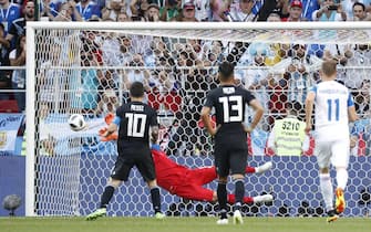 epa06813219 Goalkeeper Hannes Halldorsson of Iceland saves the penalty of Lionel Messi of Argentina during the FIFA World Cup 2018 group D preliminary round soccer match between Argentina and Iceland in Moscow, Russia, 16 June 2018.

(RESTRICTIONS APPLY: Editorial Use Only, not used in association with any commercial entity - Images must not be used in any form of alert service or push service of any kind including via mobile alert services, downloads to mobile devices or MMS messaging - Images must appear as still images and must not emulate match action video footage - No alteration is made to, and no text or image is superimposed over, any published image which: (a) intentionally obscures or removes a sponsor identification image; or (b) adds or overlays the commercial identification of any third party which is not officially associated with the FIFA World Cup)  EPA/FELIPE TRUEBA   EDITORIAL USE ONLY
