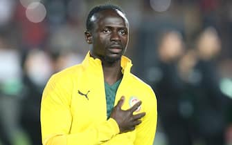epa09850076 Sadio Mane of Senegal reacts before the FIFA Qatar 2022 World Cup Africa qualifiers match between Egypt and Senegal at the International Cairo stadium in Cairo, Egypt, 25 March 2022.  EPA/KHALED ELFIQI