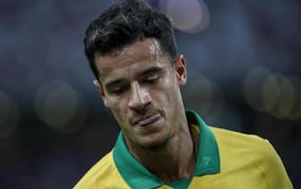 epa07918112 Philippe Coutinho of Brazil reacts during an international friendly match between Brazil and Nigeria at the National Stadium in Singapore, 13 October 2019.  EPA/WALLACE WOON