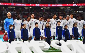 epa10323168 Players of Costa Rica sing their national anthem during the opening ceremony of the FIFA World Cup 2022 group E soccer match between Spain and Costa Rica at Al Thumama Stadium in Doha, Qatar, 23 November 2022.  EPA/Noushad Thekkayil