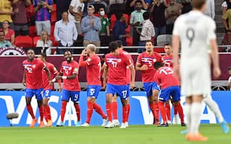 epa10013073 Joel Campbell (L) of Costa Rica celebrates with teammates after scoring the 1-0 goal during the FIFA World Cup 2022 Intercontinental playoff qualifying soccer match between Costa Rica and New Zealand in Al Rayyan, Qatar, 14 June 2022.  EPA/Noushad Thekkayil