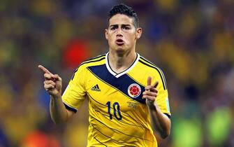 epa04557437 (FILE) A file picture dated 28 June 2014 of James Rodriguez of Colombia celebrating after scoring the 1-0 lead during the FIFA World Cup 2014 round of 16 soccer match between Colombia and Uruguay at the Estadio do Maracana in Rio de Janeiro, Brazil. James Rodriguez received the FIFA Puskas Award 2014 for the best goal of the year at the FIFA Ballon d'Or 2014 gala at the Kongresshaus in Zurich, Switzerland on 12 January 2015.  EPA/ANTONIO LACERDA