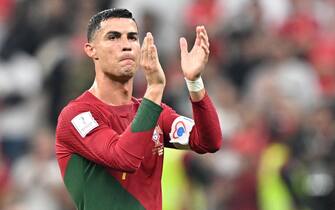 epa10352953 Cristiano Ronaldo of Portugal reacts after the FIFA World Cup 2022 round of 16 soccer match between Portugal and Switzerland at Lusail Stadium in Lusail, Qatar, 06 December 2022.  EPA/Noushad Thekkayil