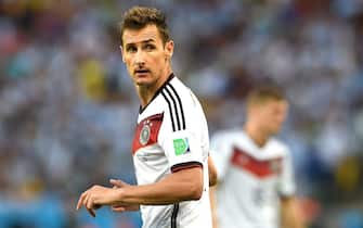 epa04314498 Miroslav Klose of Germany reacts during the FIFA World Cup 2014 final between Germany and Argentina at the Estadio do Maracana in Rio de Janeiro, Brazil, 13 July 2014. (RESTRICTIONS APPLY: Editorial Use Only, not used in association with any commercial entity - Images must not be used in any form of alert service or push service of any kind including via mobile alert services, downloads to mobile devices or MMS messaging - Images must appear as still images and must not emulate match action video footage - No alteration is made to, and no text or image is superimposed over, any published image which: (a) intentionally obscures or removes a sponsor identification image; or (b) adds or overlays the commercial identification of any third party which is not officially associated with the FIFA World Cup)  EPA/ANDREAS GEBERT   EDITORIAL USE ONLY