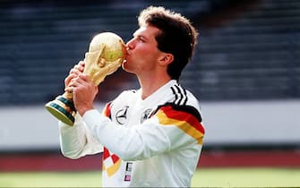 Lothar Matthaeus will celebrate his 60th birthday on March 21, 2021. Archive photo: Lothar MATTHAEUS, Germany, football, national team, with the World Cup trophy, kisses the World Cup trophy, half-length portrait, 29.10.199.0 ¬ | usage worldwide
