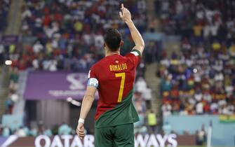 epa10325558 Cristiano Ronaldo of Portugal celebrates scoring the 1-0 by penalty during the FIFA World Cup 2022 group H soccer match between Portugal and Ghana at Stadium 947 in Doha, Qatar, 24 November 2022.  EPA/Rolex dela Pena