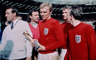 30th July 1966:  England captain Bobby Moore (1941 - 1993) with the Jules Rimet trophy, following England's 4-2 victory after extra time over West Germany in the World Cup Final at Wembley Stadium. Moore was subsequently voted 'Player Of The World Cup'.  (Photo by Hulton Archive/Getty Images)