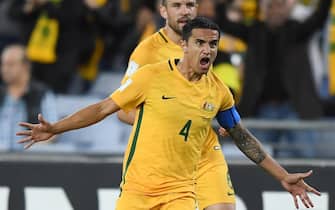 epa06256079 Australia's Tim Cahill celebrates with his teammates after scoring a goal during the 2018 FIFA World Cup qualifying soccer match between Australia and Syria at Stadium Australia in Sydney, New South Wales, Australia, 10 October 2017.  EPA/DAVID MOIR  AUSTRALIA AND NEW ZEALAND OUT  EDITORIAL USE ONLY