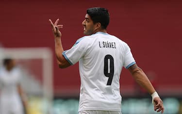 epa08742261 Luis Suarez of Uruguay reacts, during a match for the South American qualifiers for the FIFA World Cup Qatar 2022, between Ecuador and Uruguay, at the Liga Deportiva Universitaria Stadium, in Quito, Ecuador, 13 October 2020.  EPA/Jose Jacome / POOL