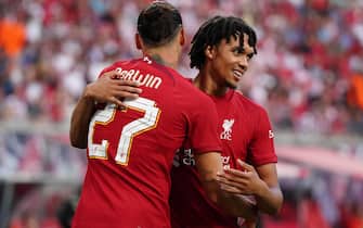 epa10084889 Liverpool’s Darwin Nunez (L) and Liverpool’s Trent Alexander-Arnold celebrate after scoring the 0-3 goal during the pre-season international friendly soccer match between RB Leipzig and Liverpool FC in Leipzig, Germany, 21 July 2022.  EPA/CLEMENS BILAN