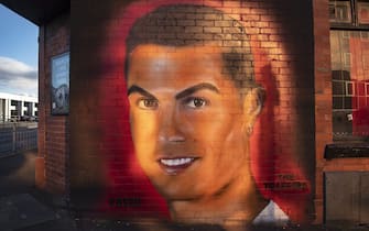 MANCHESTER, ENGLAND - APRIL 01: A mural of Cristiano Ronaldo painted on the wall of the Trafford pub, close to Old Trafford, home of Manchester United FC on April 1, 2022 in Manchester, United Kingdom. (Photo by Visionhaus/Getty Images)