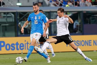 Italy's   Brian Cristante    and Germany's Leon Goretzka   in action during the Uefa Nations League,group A3,soccer match Italy vs Germany at Renato Dall'Ara stadium in Bologna, Italy, 04 June 2022. ANSA /SERENA CAMPANINI