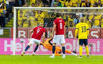 SOLNA, SWEDEN - JUNE 05: Erling Haaland of Norway scores the 1-0 goal by penalty during the UEFA Nations League League B Group 4 match between Sweden and Norway at Friends Arena on June 5, 2022 in Solna, Sweden. (Photo by Michael Campanella/Getty Images)