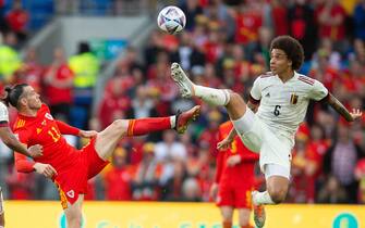 epa10008478 Wales' captain Gareth Bale (L) in action with Belgium's Axel Witsel (R) during the UEFA Nations League -  Group 4 soccer match between Wales and Belgium in Cardiff, Wales, Britain, 11 June 2022.  EPA/PETER POWELL .