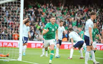 epa10008135 Ireland's Alan Browne (C-L) celebrates after scoring the 1-0 lead during the UEFA Nations League soccer match between Ireland and Scotland in Dublin, Ireland, 11 June 2022.  EPA/Aidan Crawley