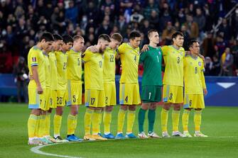 PARIS, FRANCE - NOVEMBER 13: Players of Kazakhstan take part in a minute of silence prior to the 2022 FIFA World Cup Qualifier match between France and Kazakhstan at Stade de France on November 13, 2021 in Paris,  France. (Photo by Tnani Badreddine/Quality Sport Images/Getty Images)