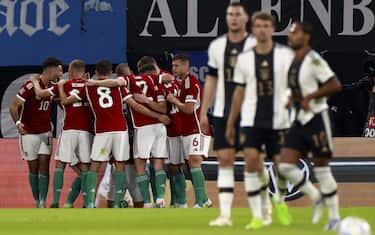 epa10202241 Players of Hungary celebrate their 1-0 lead during the UEFA Nations League soccer match between Germany and Hungary in Leipzig, Germany, 23 September 2022.  EPA/HANNIBAL HANSCHKE