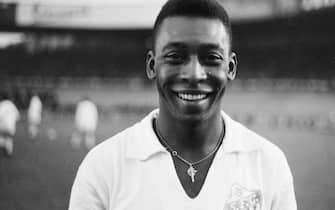 Brazilian striker PelÃ©, wearing his Santos jersey, smiles before playing a friendly soccer match with his club against the French club of "Racing", on June 13, 1961 in Colombes, in the suburbs of Paris.  PelÃ© score one goal as Santos won 5-4. Widely considered to be the greatest player in soccer history, PelÃ© scored 1282 goals in his career and won three World Cup titles with Brazil (1958 in Sweden, 1962 in Chile, 1970 in Mexico). / AFP PHOTO / -        (Photo credit should read -/AFP via Getty Images)