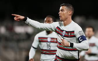 epa09107471 Portugal's Cristiano Ronaldo reacts during the FIFA World Cup 2022 qualifying soccer match between Luxembourg and Portugal in Luxembourg, 30 March 2021.  EPA/Julien Warnand
