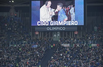 A picture of late Italian journalist Giampiero Galeazzi is displayed on a huge screen prior to the 2022 FIFA World Cup European qualifying  Group C soccer match between Italy and Switzerland at the Olimpico stadium in Rome, Italy, 12 November 2021.  ANSA/ETTORE FERRARI