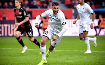 epa07139003 Hoffenheim's Vincenzo Grifo (C) celebrates after scoring the 3-1 lead from the penalty spot during the German Bundesliga soccer match between Bayer Leverkusen and TSG 1899 Hoffenheim in Leverkusen, Germany, 03 November 2018.  EPA/SASCHA STEINBACH CONDITIONS - ATTENTION: The DFL regulations prohibit any use of photographs as image sequences and/or quasi-video.