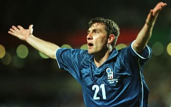 Italian forward Christian Vieri  raises his arms in the air and celebrates his 2-0 goal against Cameroon. Italy wins their 1998 World Cup group B game against Cameroon by a score of 3-0 at the Stade de la Mosson in Montpellier, France on 17 June 1998. Vieri decided the third and final goal of the game for his team. (Photo by Oliver Berg/picture alliance via Getty Images)
