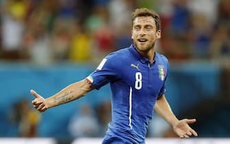 epa04257658 Claudio Marchisio of Italy celebrates after scoring the 1-0 during the FIFA World Cup 2014 group D preliminary round match between England and Italy at the Arena Amazonia in Manaus, Brazil, 14 June 2014. 

(RESTRICTIONS APPLY: Editorial Use Only, not used in association with any commercial entity - Images must not be used in any form of alert service or push service of any kind including via mobile alert services, downloads to mobile devices or MMS messaging - Images must appear as still images and must not emulate match action video footage - No alteration is made to, and no text or image is superimposed over, any published image which: (a) intentionally obscures or removes a sponsor identification image; or (b) adds or overlays the commercial identification of any third party which is not officially associated with the FIFA World Cup)  EPA/   EDITORIAL USE ONLY