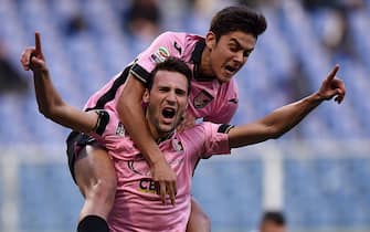 GENOA, ITALY - JANUARY 25:  Franco Vazquez of Palermo celebrates with Paulo Dybala after scoring the equalizing goal (1-1) during the Serie A match between UC Sampdoria and US Citta di Palermo at Stadio Luigi Ferraris on January 25, 2015 in Genoa, Italy.  (Photo by Tullio M. Puglia/Getty Images)