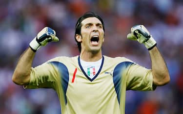 BERLIN - JULY 9:  Goalkeeper Gianluigi Buffon of Italy celebrates his team's first goal during the FIFA World Cup Germany 2006 Final match between Italy and France at the Olympic Stadium on July 9, 2006 in Berlin, Germany.  (Photo by Shaun Botterill/Getty Images)