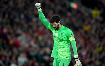 Liverpool goalkeeper Alisson celebrates his sides third goal during the UEFA Champions League quarter final, second leg match at Anfield, Liverpool. Picture date: Wednesday April 13, 2022.