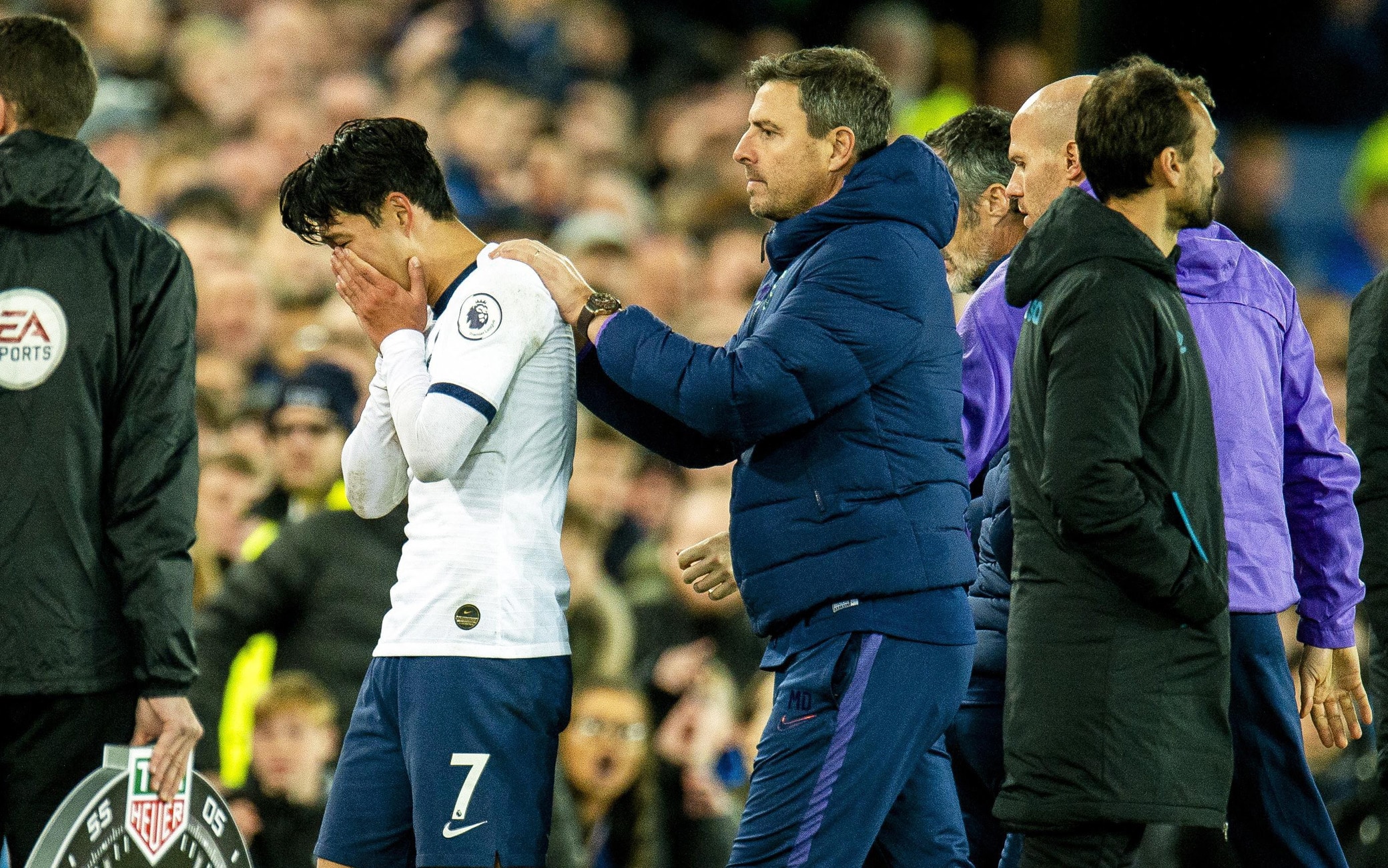 epa07970274 Tottenham Hotspur's Son Heung-min (L) reacts after tackling Everton's Andre Gomes causing an injury to the Everton player during the English Premier League soccer match between Everton FC and Tottenham Hotspur at the Goodison Park in Liverpool, Britain, 03 November 2019.  EPA/PETER POWELL EDITORIAL USE ONLY. No use with unauthorized audio, video, data, fixture lists, club/league logos or 'live' services. Online in-match use limited to 120 images, no video emulation. No use in betting, games or single club/league/player publications